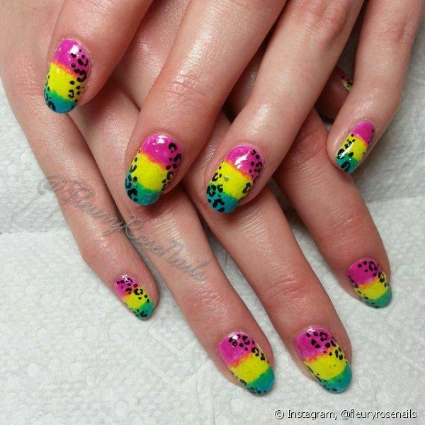 Inspirada no arco-?ris, a nail artist adicionou um toque irreverente a unha colorida com a estampa de on?a
